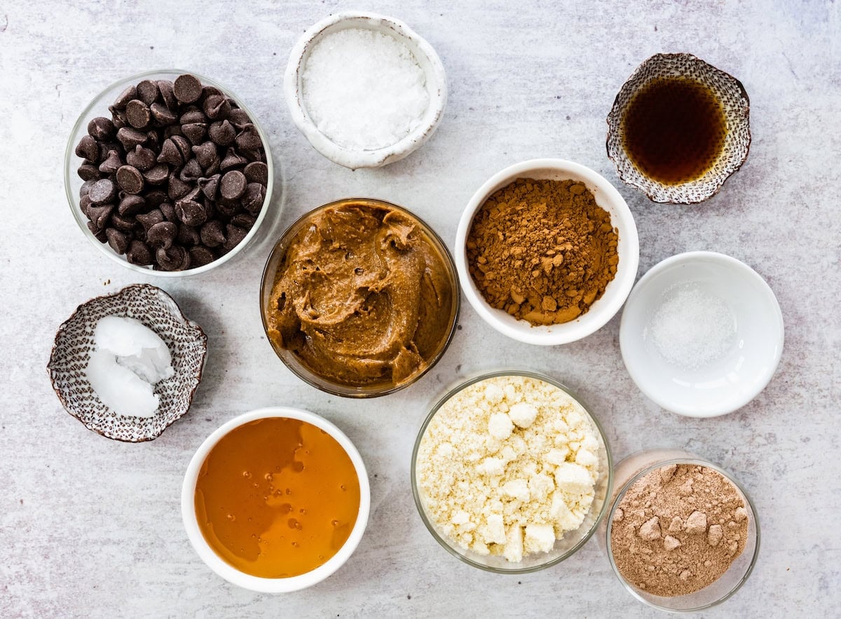ingredients in bowls to make brownie protein balls.