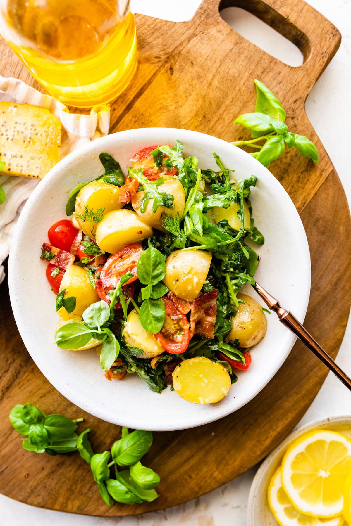 no mayo potato salad on plate with fork.