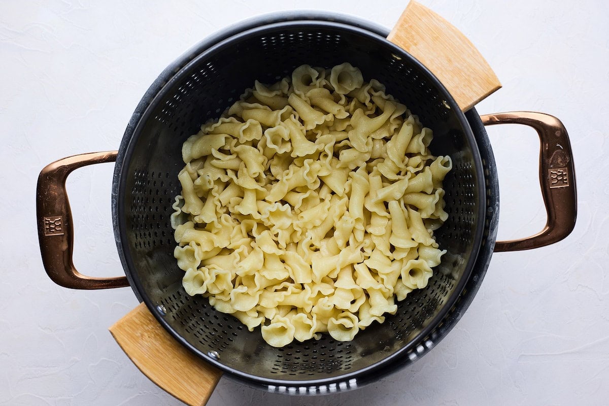 pasta draining in colander.