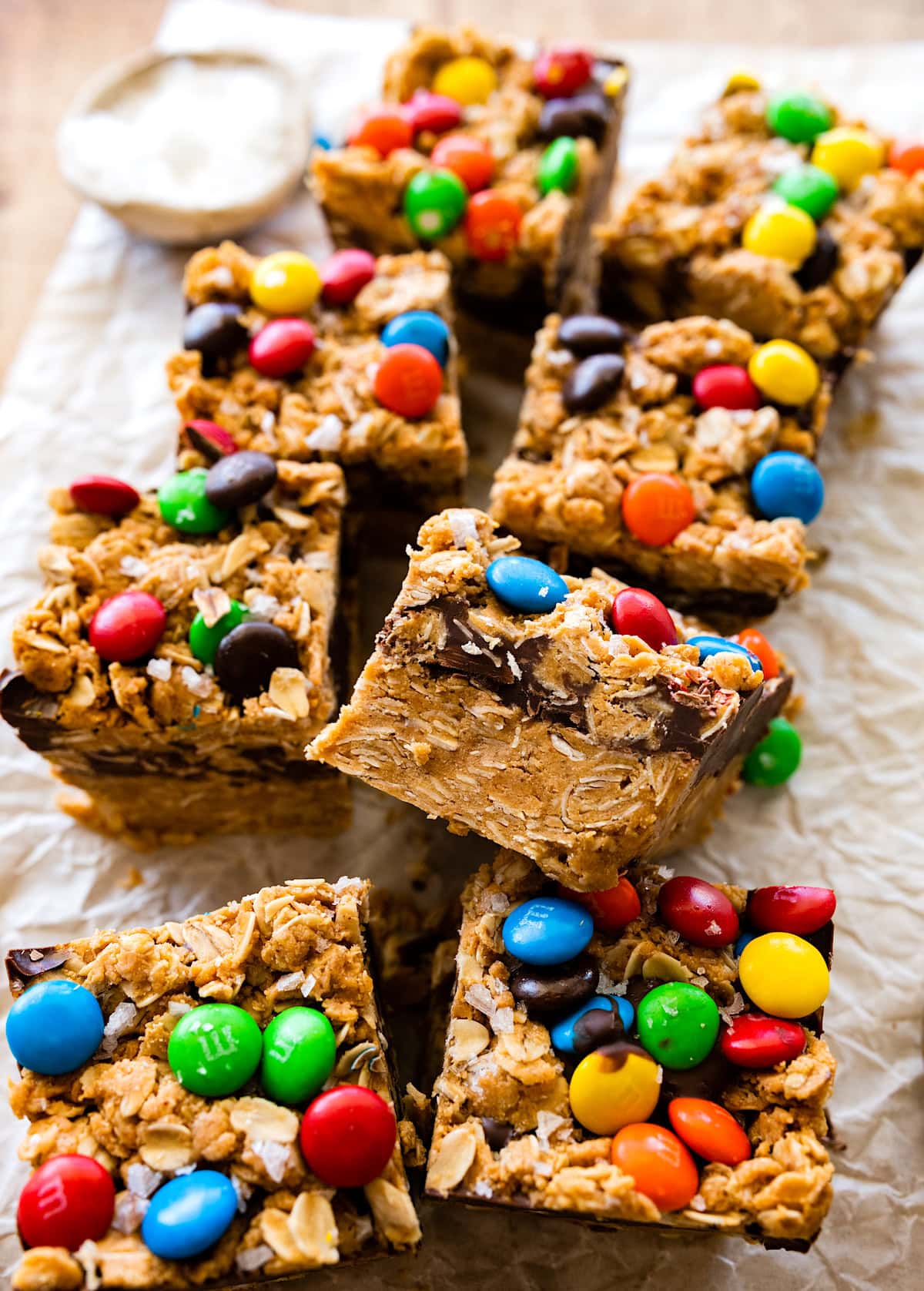no bake monster cookie bars cut into squares with M&M's.