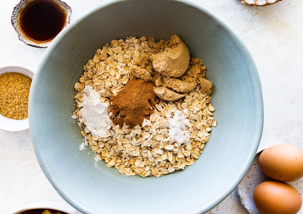 dry ingredients in mixing bowl to make peach baked oatmeal.