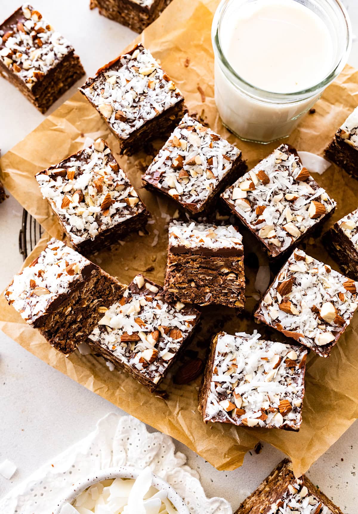 no bake almond joy bars with glass of milk.