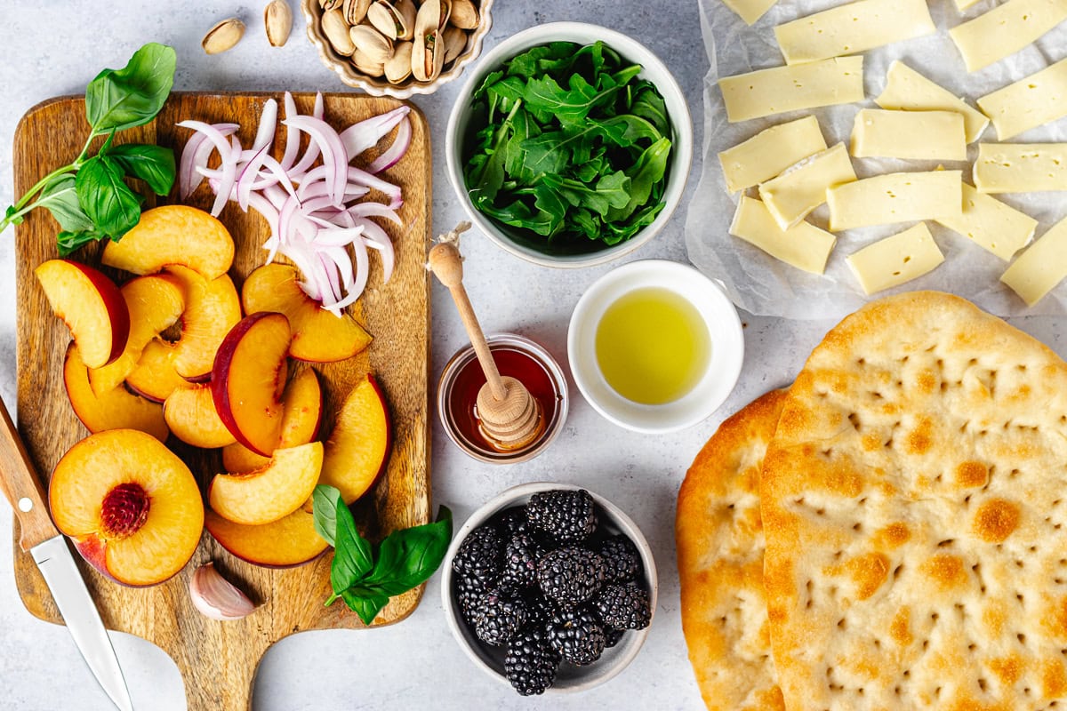ingredients to make peach brie flatbread.