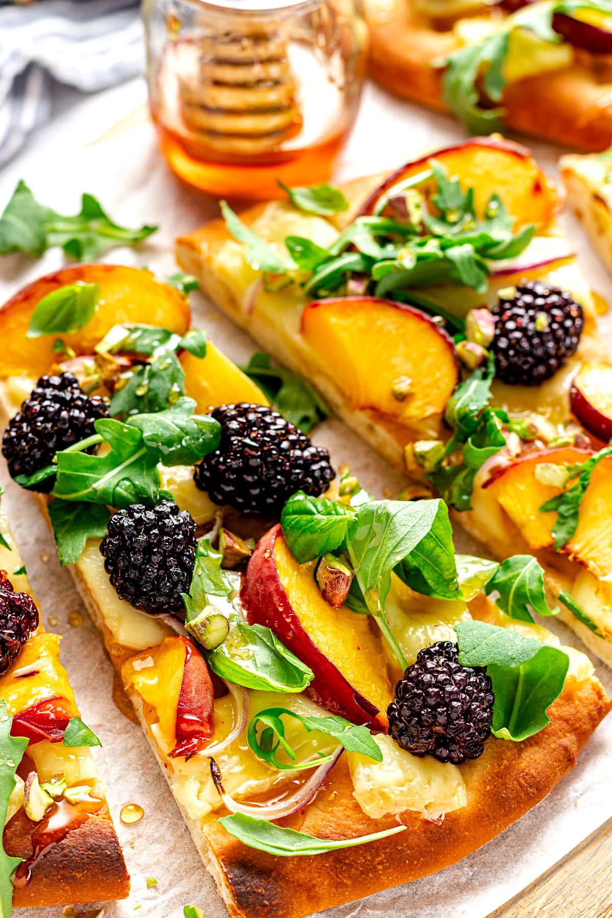 peach brie flatbread cut into pieces.