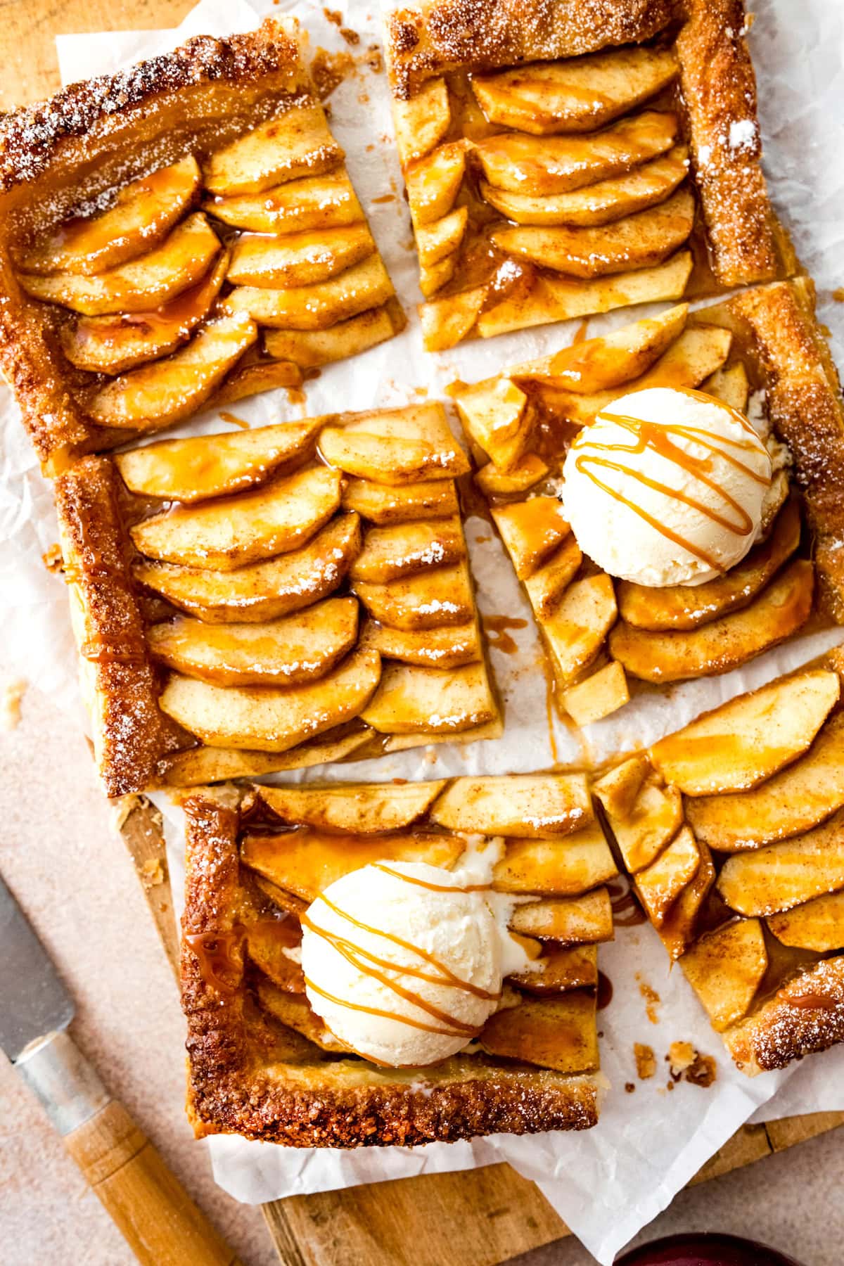 puff pastry apple tart with salted caramel sauce and vanilla ice cream.