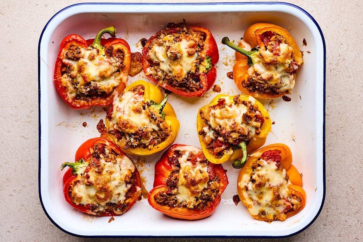 stuffed bell peppers in pan.