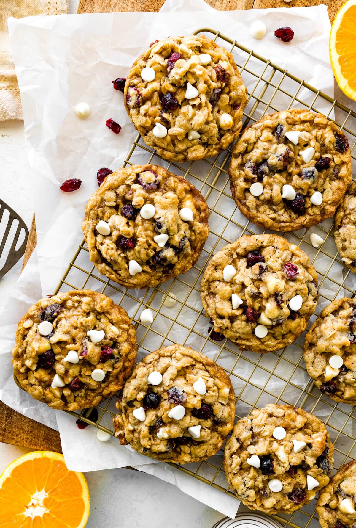 cranberry orange white chocolate oatmeal cookies on cooling rack.