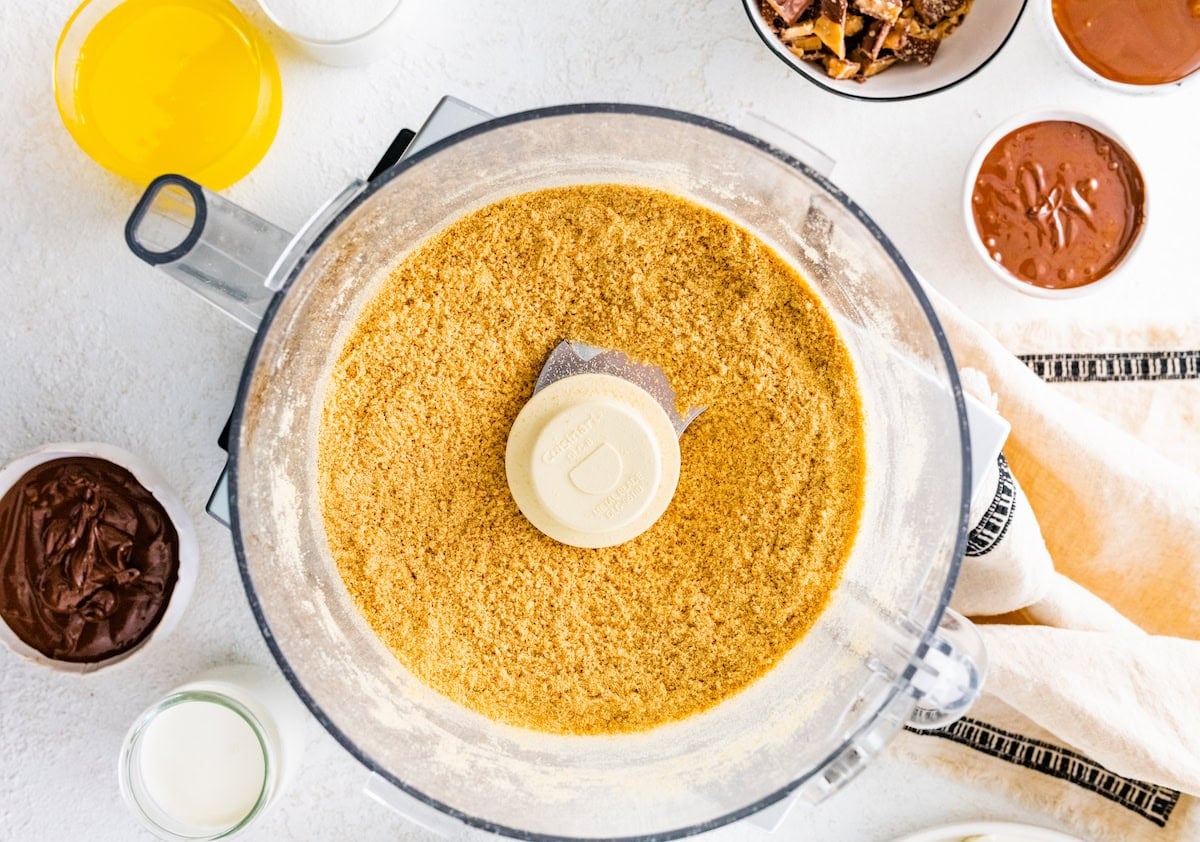 graham cracker crumbs in food processor.