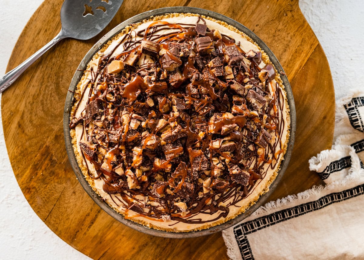 salted caramel toffee pie with chocolate and caramel drizzle.