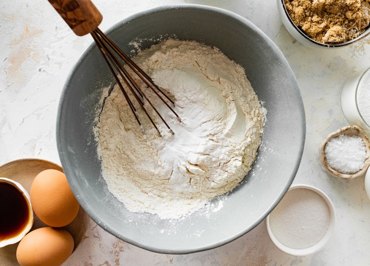 dry ingredients being whisked together in mixing bowl.