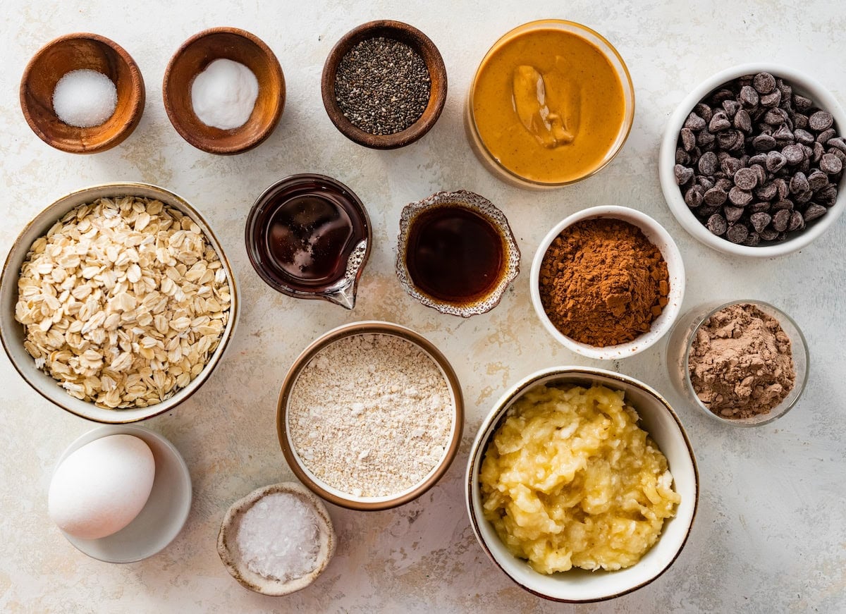 ingredients in bowls to make healthy chocolate cookies.