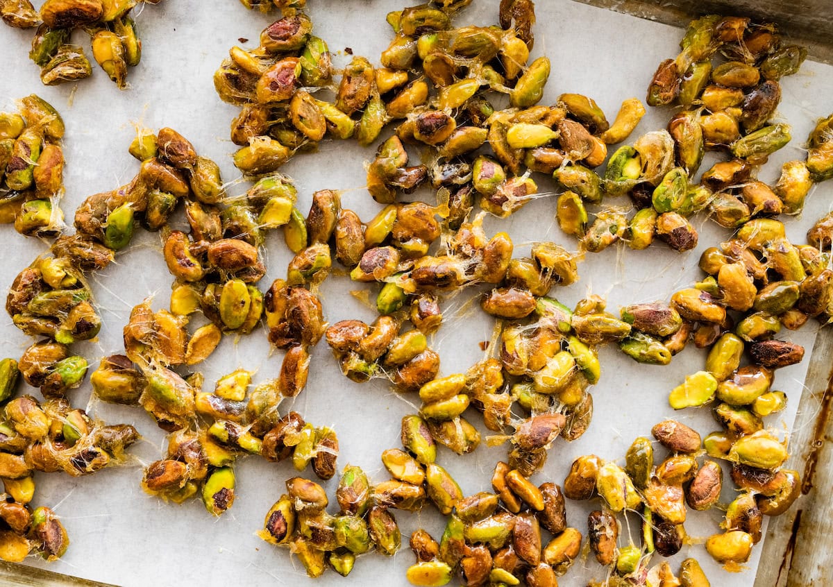 candied pistachios on baking sheet.