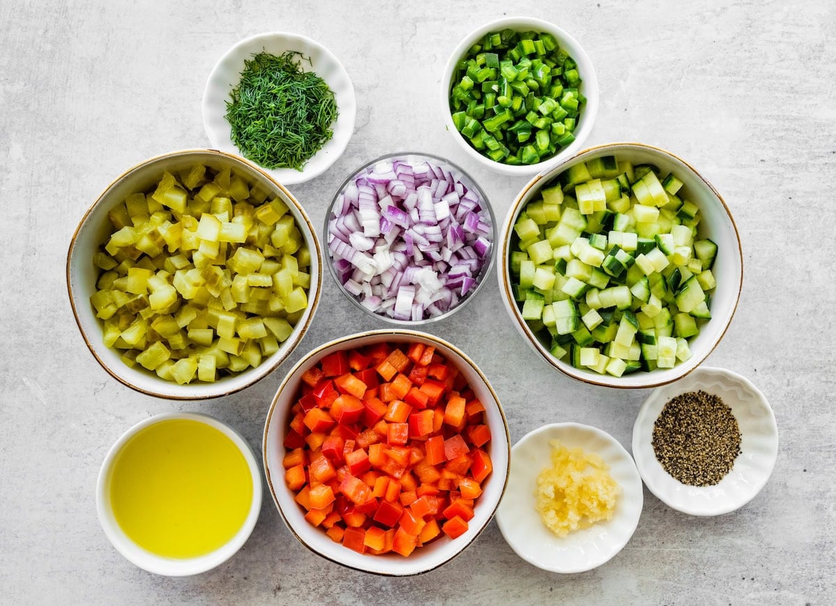 ingredients to make pickle de gallo in bowls.