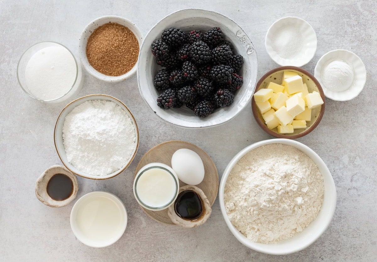 ingredients in bowls to make blackberry scones.