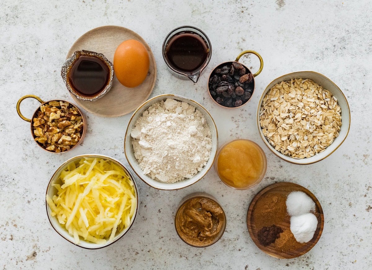 ingredients in bowls to make apple breakfast cookies. 