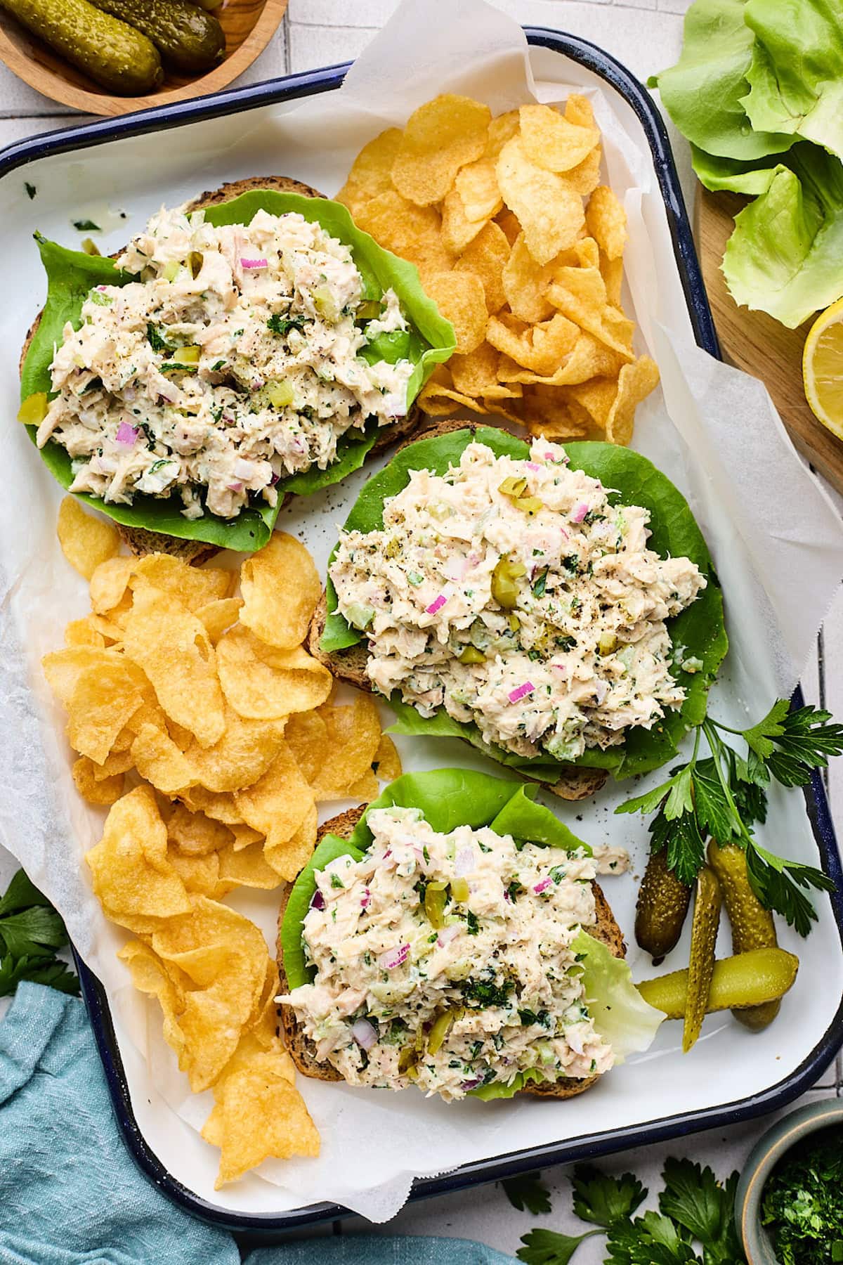 tuna salad in lettuce cups with potato chips.
