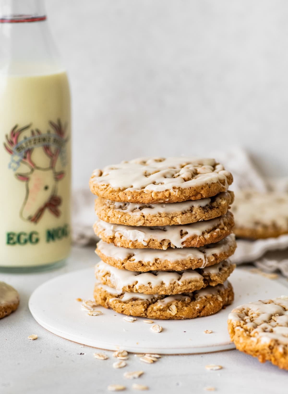 stack of eggnog iced oatmeal cookies.