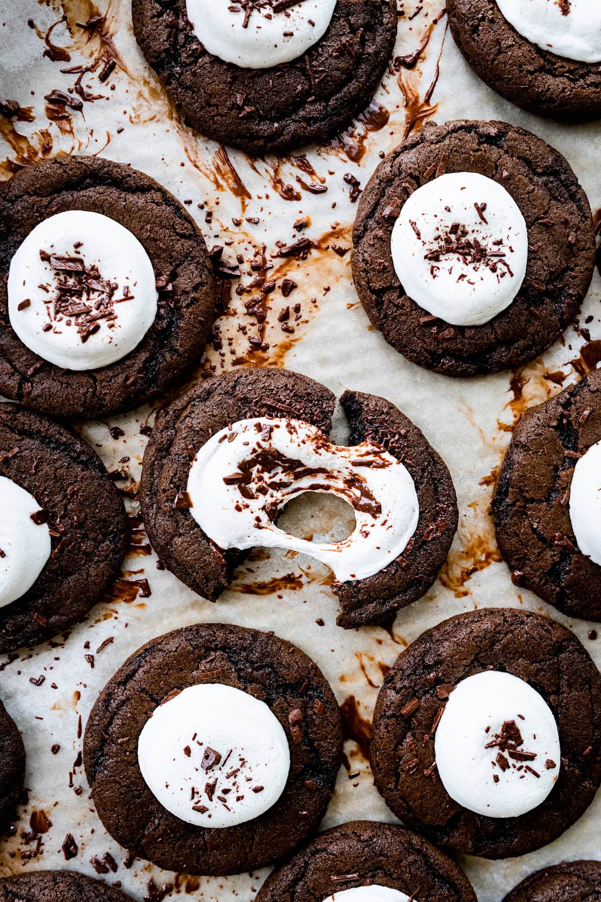 hot cocoa cookies with gooey marshmallow center and chocolate shavings on top. 