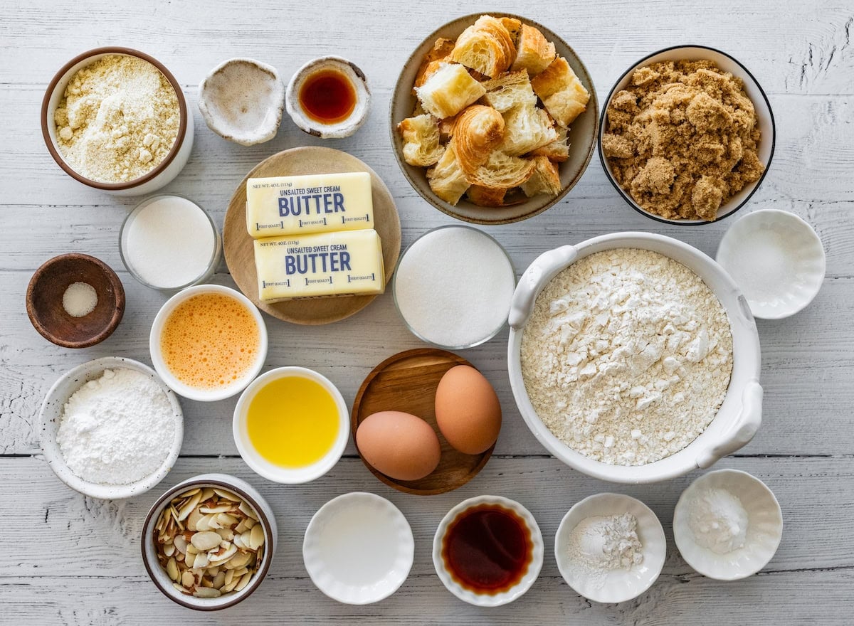 ingredients in bowls to make almond croissant cookies.